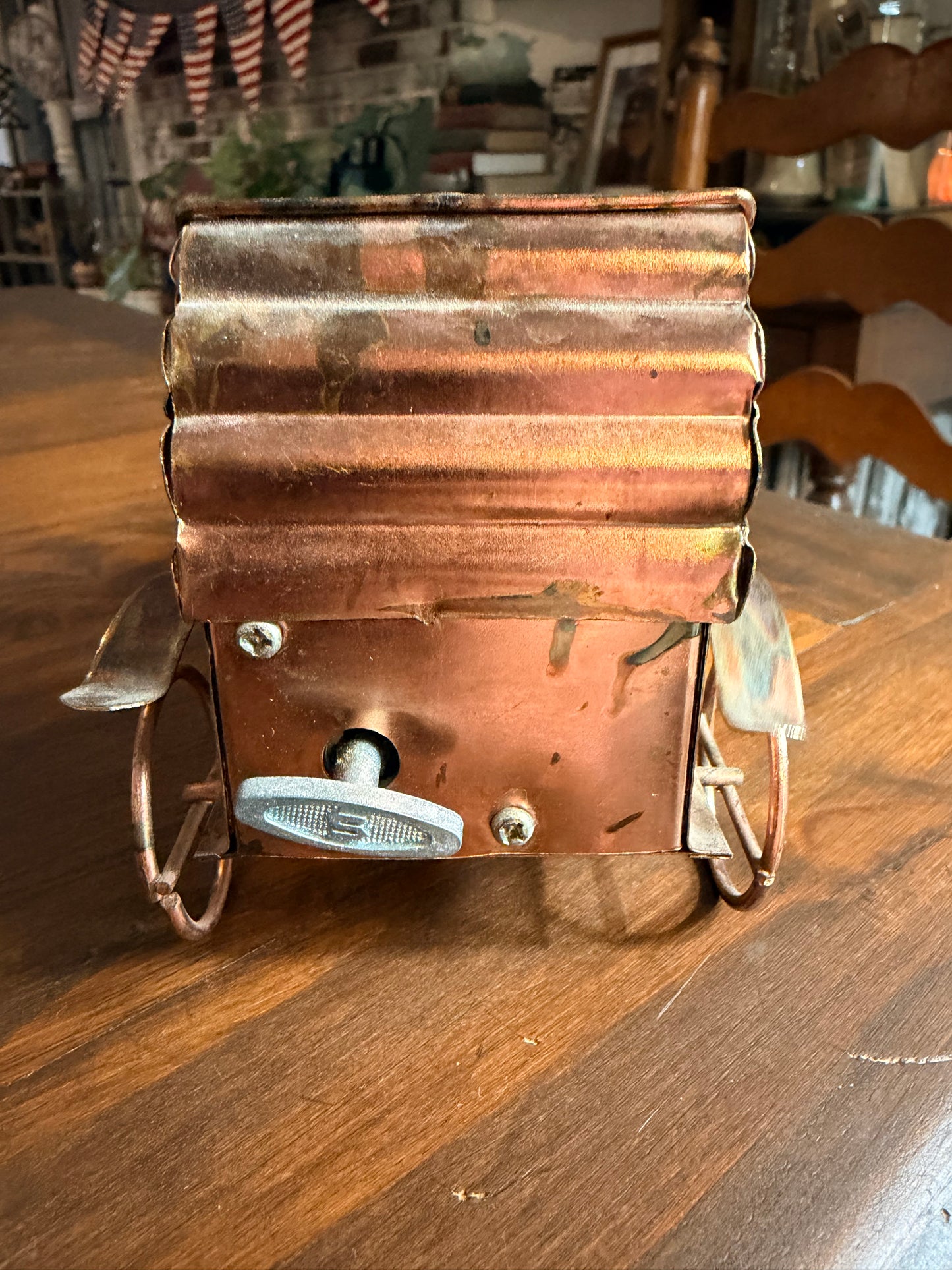 Vintage copper and tin metal antique car music box