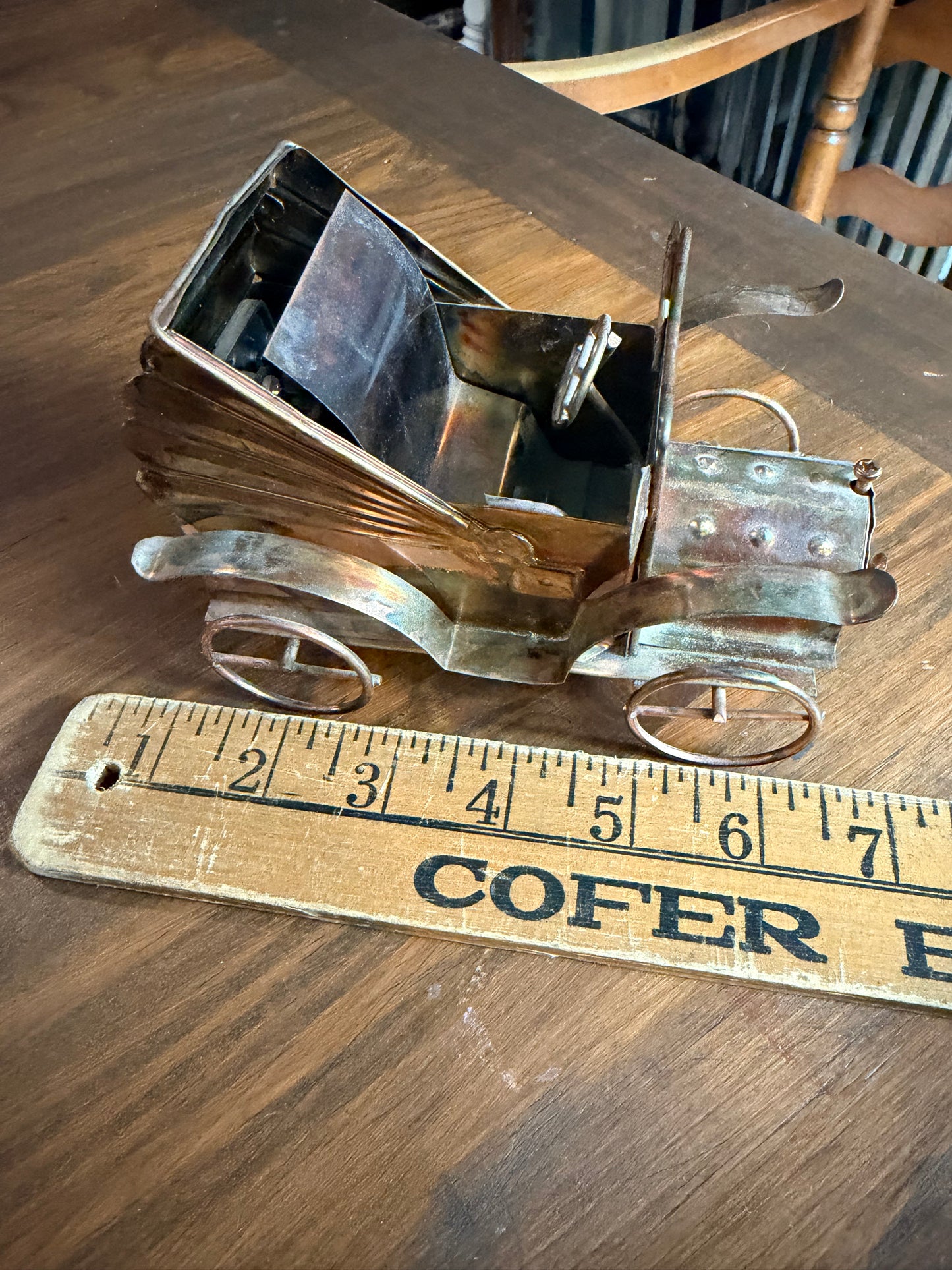 Vintage copper and tin metal antique car music box