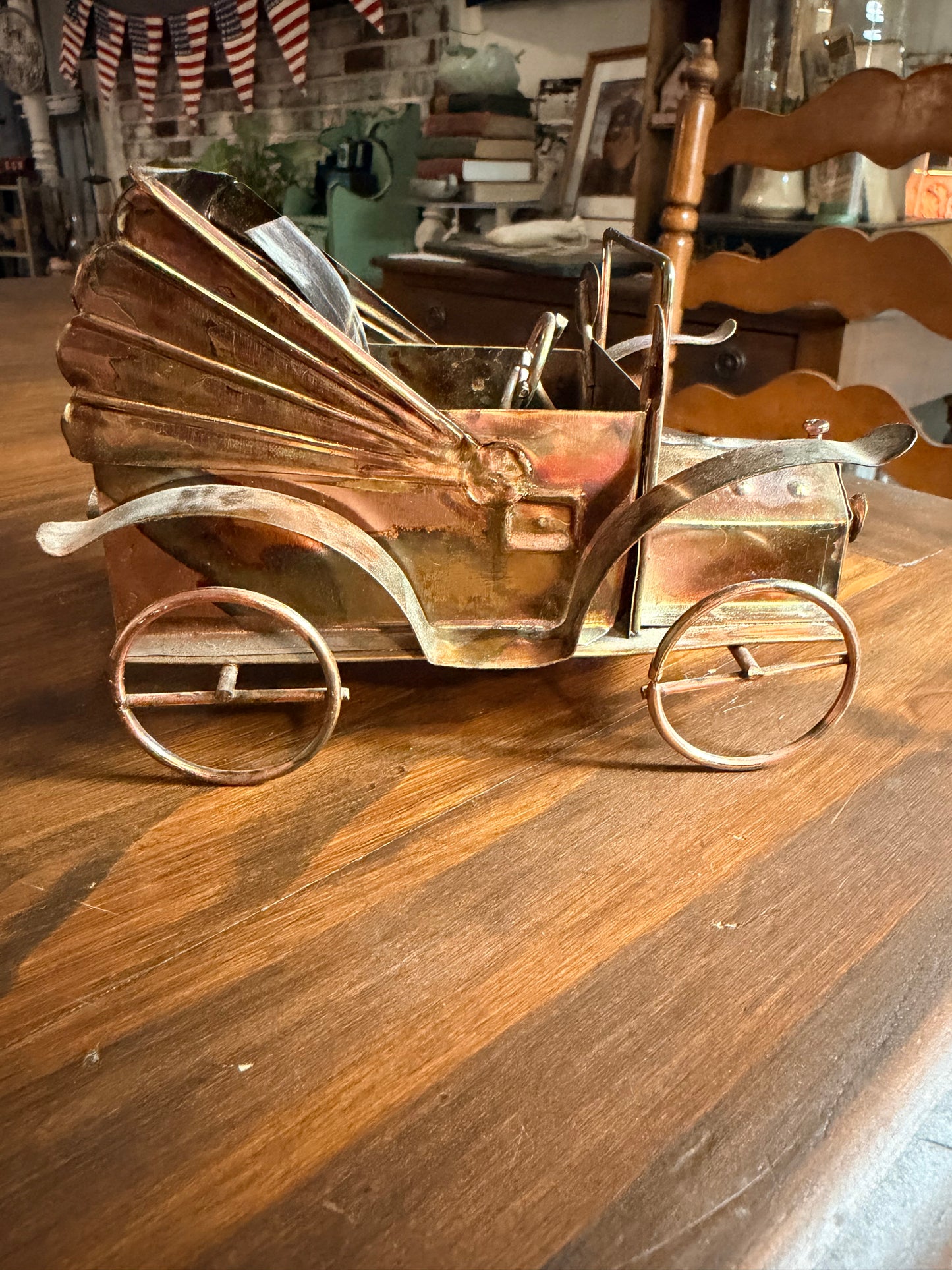 Vintage copper and tin metal antique car music box